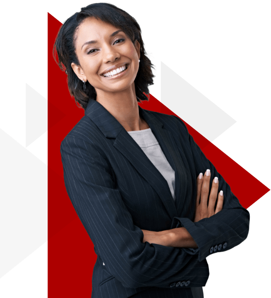 Young woman in business attire smiling in front of red triangle