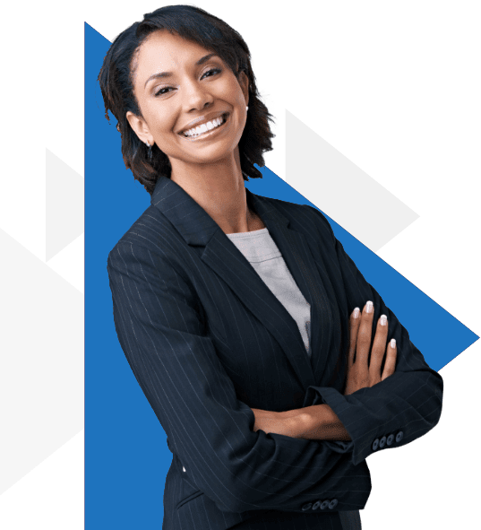 Young woman in business attire smiling in front of red triangle